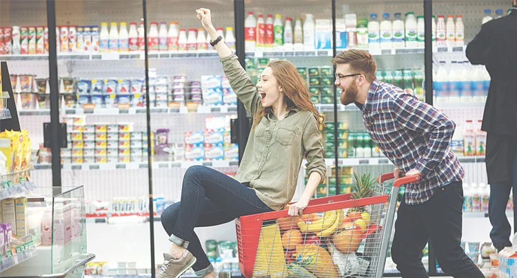 graphic showing young couple shopping in a grocery store